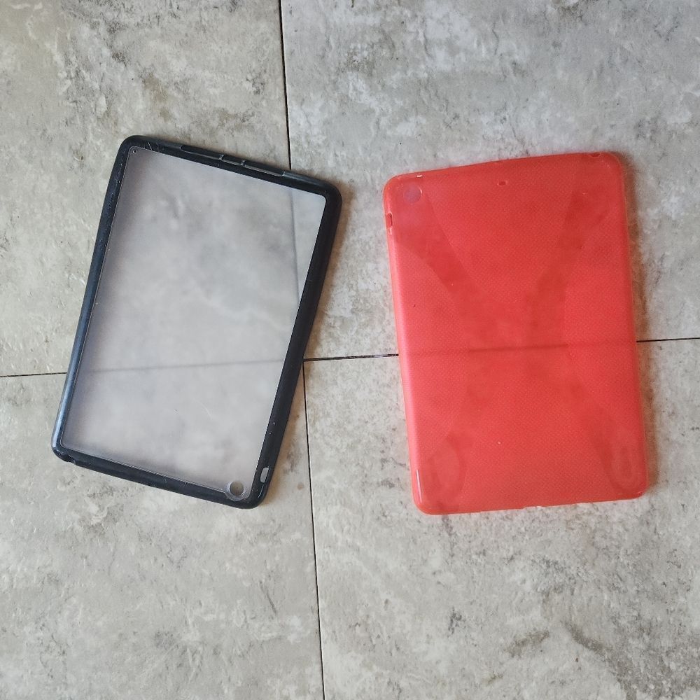 2 iPad mini cases 8.5" × 5.5" One orange soft-sided. One clear with a black rim